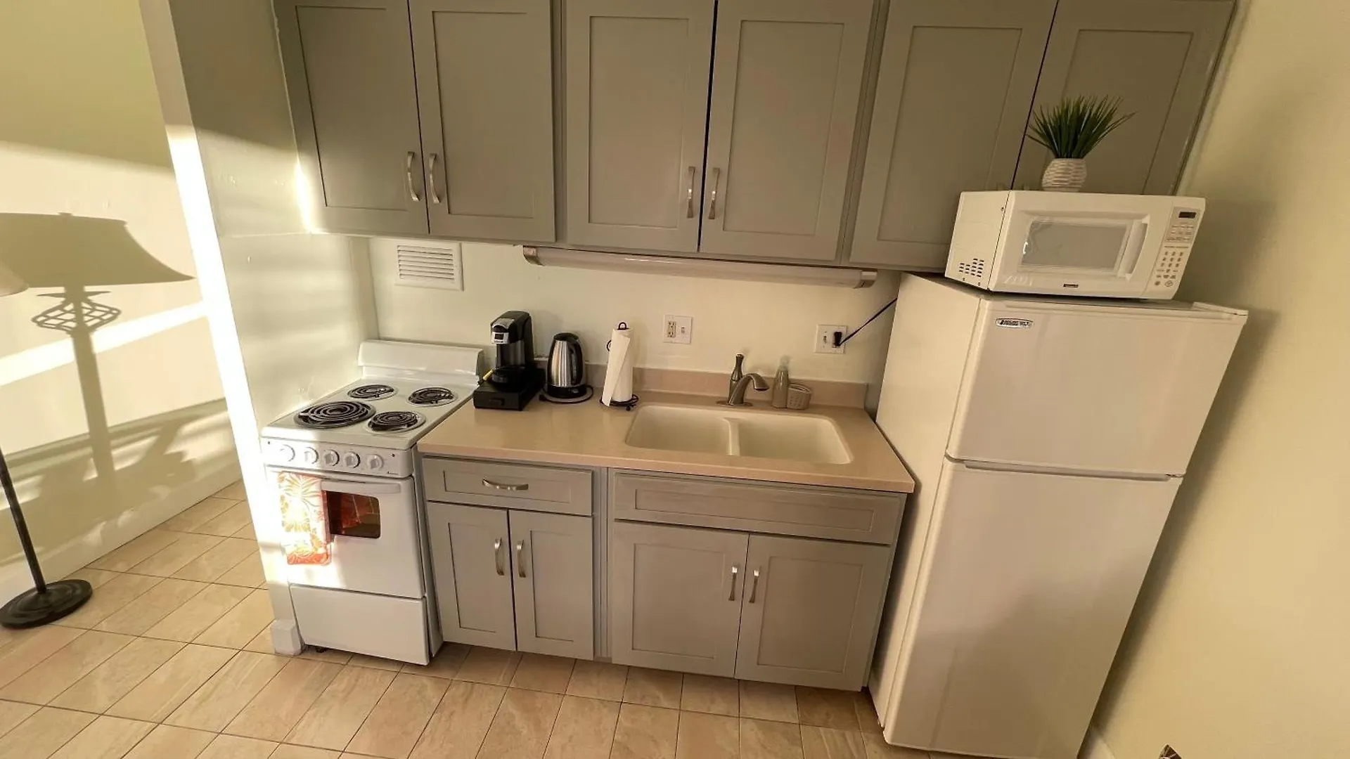 Tropical Studios at Marine Surf Waikiki: Beachfront Oasis with Full Kitchen Honolulu Apartment